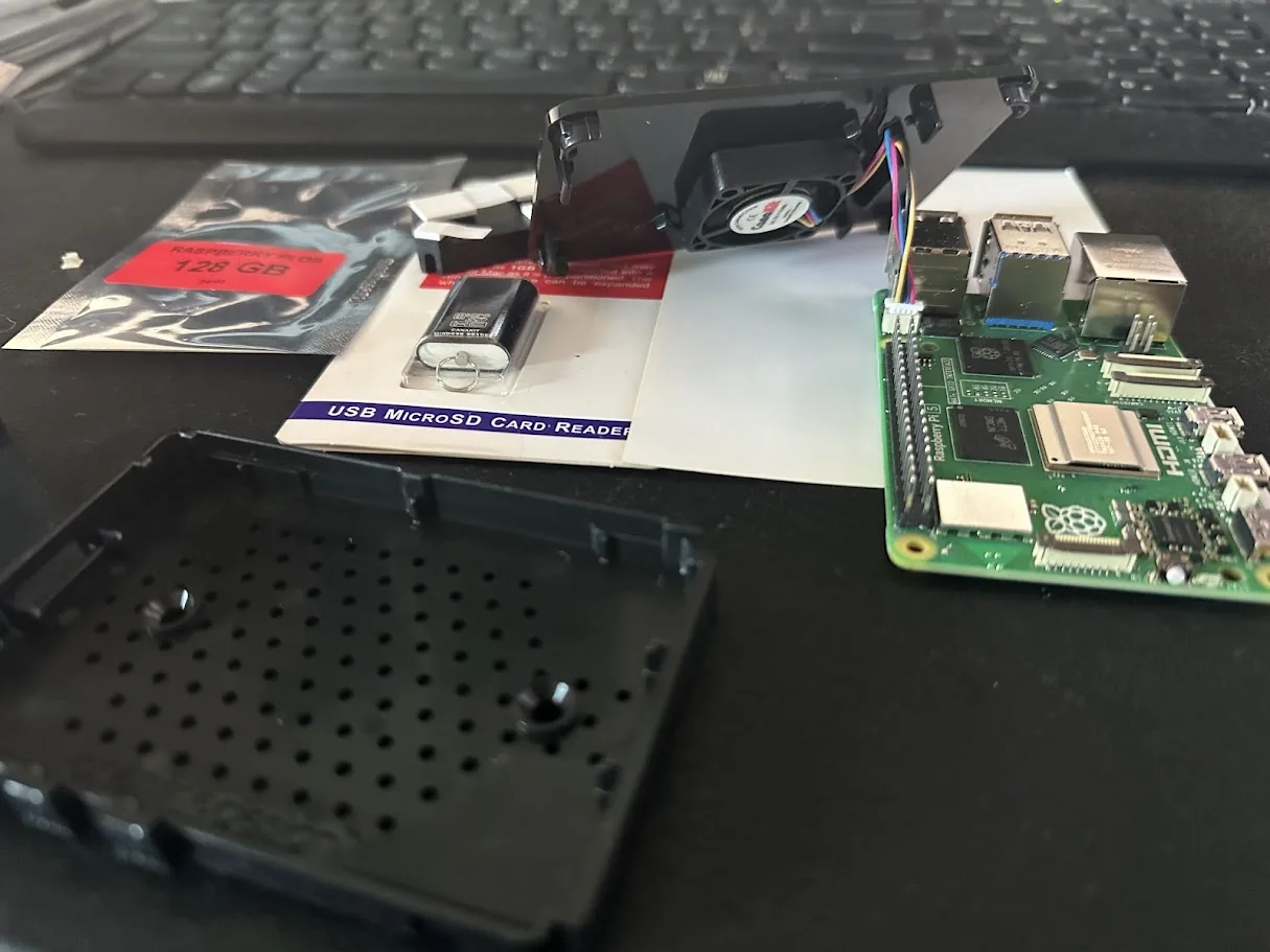 The Raspberry Pi 5 board with case and fan